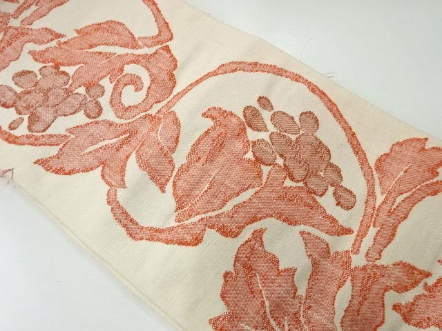 アンティーク　手織り真綿紬花唐草模様織出し名古屋帯